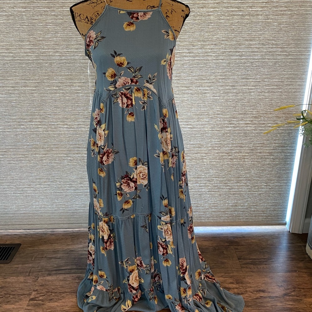 Long blue dress with floral designs